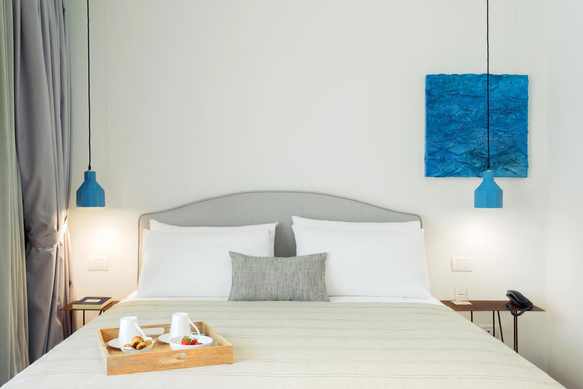 Domia Boutique Hotel E Cucina مونديلّو الغرفة الصورة